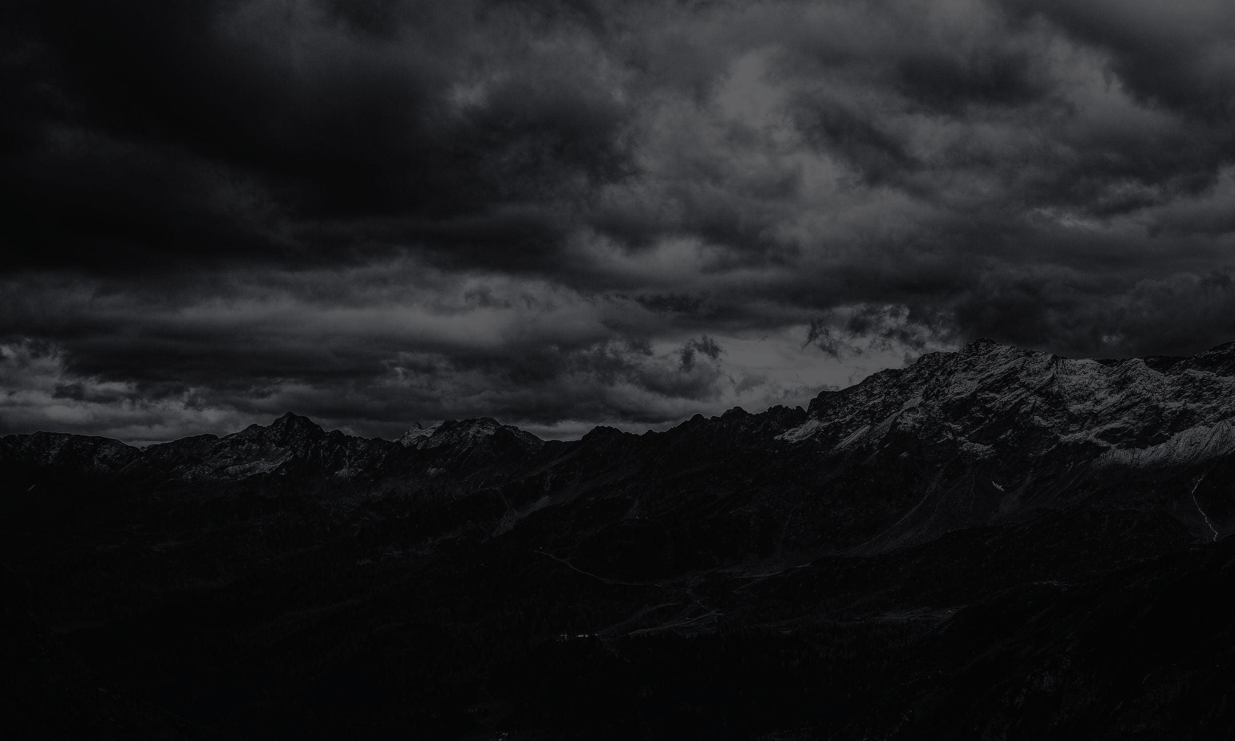 mountain ridge and dark sky